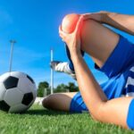 Athlete experiencing shoulder pain during recovery after sports injury due to delayed treatment